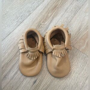 Baby freshly picked mocasins